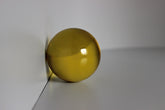 Glazen gele bol met diameter 50 mm.
