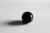 Glazen zwarte bol met diameter 25 mm.