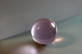Glazen licht roze bol met diameter 60 mm.