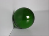 Glazen groene bol met diameter 100 mm.